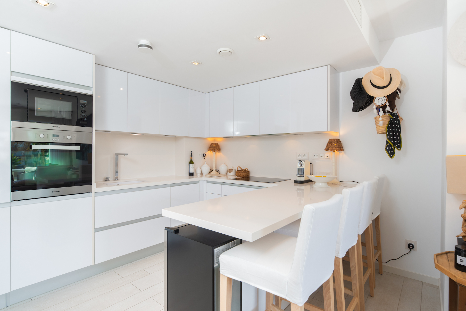Resa Estates apartment for sale in Ibiza marina botafoch modern kitchen and bar.jpg